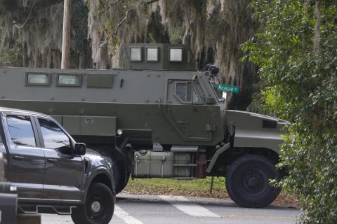 A SWAT team armored vehicle pulls onto SW Michigan Street on Monday afternoon during the search for an armed burglary suspect. The suspect, described as a tall male in dark clothing, was not captured. (JAMIE WACHTER/Lake City Reporter)