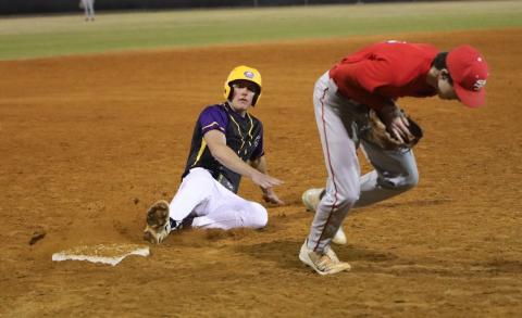 Columbia pitcher Tison McCray slides safely into third base against Santa Fe on Monday. (BRENT KUYKENDALL/Lake City Reporter)