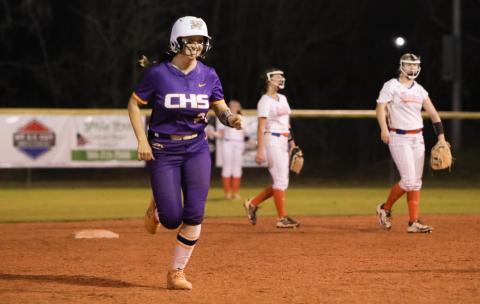 Columbia catcher Emily Delgado smiles running to third base after hitting a solo home run against Bronson on Thursday. (BRENT KUYKENDALL/Lake City Reporter)