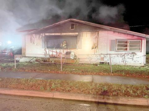 A SE Murray Street house was severely damaged by a fire Saturday night. A dog was killed in the blaze. (COURTESY LAKE CITY FIRE DEPARTMENT)