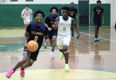Columbia guard Murkail Cray races for a layup after snatching a steal against Lincoln in the fourth quarter of Saturday's Region 1-5A quarterfinal. (JORDAN KROEGER/Lake City Reporter)