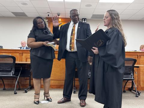 Clyde Fleming was sworn in as the new District 2 commissioner in Suwannee County by County Judge Jennifer Griffin on Tuesday. Fleming was accompanied by his wife, Patricia. (JAMIE WACHTER/Lake City Reporter)