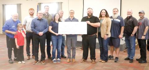 Members of the Kiwanis Club of Lake City doanted $12,500 to the Foundation of Florida Gateway College on Tuesday to endow a career and technical education scholarship. The scholarship will be named in honor of Sandy Swilley, a longtime Kiwanis Club officer. (JAMIE WACHTER/Lake City Reporter)