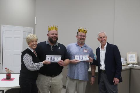 James Carter and Eddie Kurtz are presented their prizes after winning the Lake City Garden Club's annual Scrabble Tournament. (MORGAN MCMULLEN/Lake City Reporter)