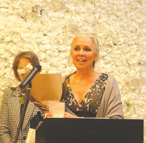 Suwannee Middle School math teacher Stacey Kibbe accepts the 2026 Suwannee County Teacher of the Year award Thursday. (MORGAN MCMULLEN/Lake City Reporter)