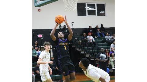 Columbia guard Shaheed White shoots against Lincoln during the Region 1-5A quarterfinals on Feb. 14. (JORDAN KROEGER/Lake City Reporter)