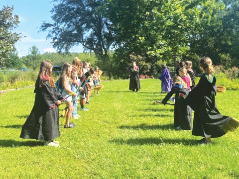 Participants in a previous Columbia County 4-H School of Life Skills for Magical Beings Day camp take part in an outdoor team challenge. Columbia County 4-H is set to host a wide variety of summer programs and camps, both practical and whimsical. (COURTESY)