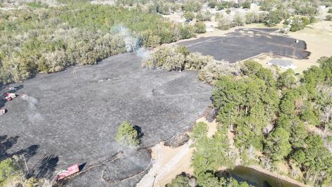 Columbia County Fire Rescue crews, along with the Lake City Fire Department and the Florida Forest Service, battled a brush fire in beween Sisters Welcome Road and Interstate 75 on Monday afternoon. The interstate was shut down temporarily due to poor visibility from the smoke. (ISAIAH CULLY/Special to the Reporter)