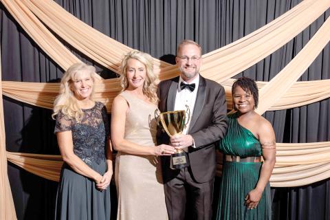 David and Ashleigh Pitzer were named the Suwannee County Chamber of Commerce Citizens of the Year at the Chamber Gala on Saturday night. The Pitzers were honored by Julie Ulmer (left), the Chamber’s new president, and Executive Director Danielle Hampton. (DENVER JERNIGAN/Special to the Reporter)