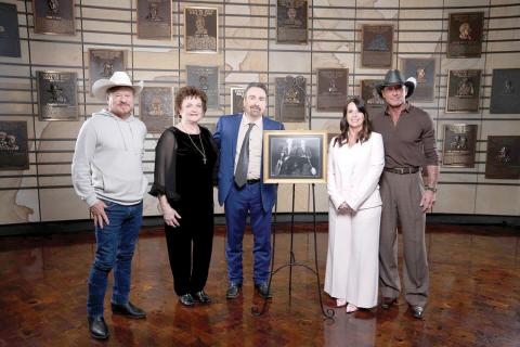 Lake City’s Jeanie Stanley Allinder (second from left), the daughter of Carter Stanley, is pictured with her cousins Ralph Stanley II and Lisa Stanley Marshall as their fathers, The Stanley Brothers, were inducted into the Country Music Hall of Fame on Friday alongside Tim McGraw (right) and Paul Overstreet. (COURTESY)