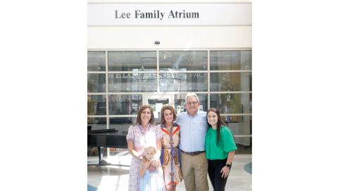 The Lee Family Atrium was dedicated in the Wilson S. Rivers Library at Florida Gateway College on Tuesday in honor of Mike and Missy Lee. The Lees are pictured with their daughters Jessica (left) and Meghan (right) and granddaughter Lettie. (JAMIE WACHTER/Lake City Reporter)