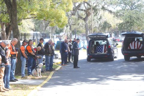 Members of the Lake City VA Medical Center, veterans and law enforcement honored a pair of veterans — Robert Zerby and Peter Daniels — during a Final Mile ceremony Thursday. (TONY BRITT/Lake City Reporter)