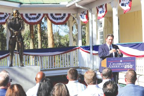 Gov. Ron DeSantis delivers remarks during an unveiling ceremony for a statue of Alexander Hamilton at the Heritage Center in White Springs on Wednesday. (TONY BRITT/Lake City Reporter)