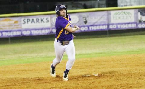 Columbia pitcher Kyler Keen turns off second base before being held up during a win over St. Augustine on March 11. (JORDAN KROEGER/Lake City Reporter)