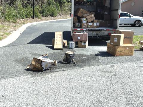 A smoking air fryer caused a brief fire in the back of a FedEx truck Friday morning. The fire was quickly doused after the driver removed the package from the truck. (COURTESY LAKE CITY FIRE DEPARTMENT)