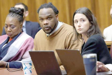 Rashaun Jones, the former Columbia High star accused of killing his University of Miami teammate Bryan Pata in 2006, sits in a courtroom at the Richard E. Gerstein Justice Building in Miami on Monday. A mistrial was declared as the jury was deadlocked. (CARL JUSTE/The Miami Herald/TNS)