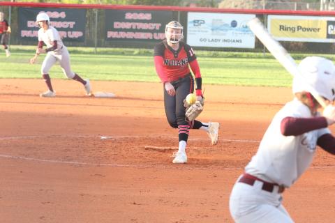Fort White pitcher Graceanne Durrance tosses a pitch during Tuesday's 18-0 loss to Madison County. (MORGAN MCMULLEN/Lake City Reporter)