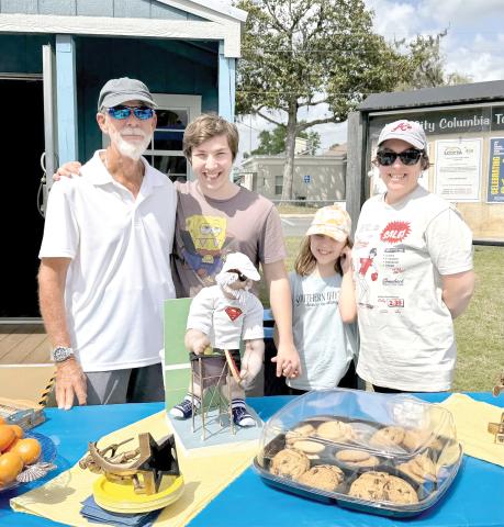 Mark Mansbach (left and below) was a board member of the Lake City Columbia County Tennis Association for five years and served as its tennis pro and a dedicated coach. (COURTESY)