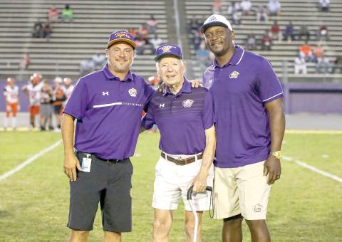 Former Columbia High coach Bobby Simmons (middle) was honored prior to a Tigers’ game in 2023. The school’s all-time winningest coach, Simmons was pictured with CHS Principal Trey Hosford, his son-in-law (left), and CHS coach Brian Allen. (BRENT KUYKENDALL/Lake City Reporter)