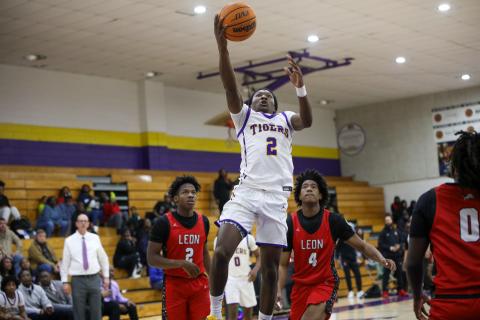 Columbia guard Kadrian Wilson rises for a bucket against Leon during the district semifinals this past season. The two teams won't be in the same district the next two seasons. (BRENT KUYKENDALL/Lake City Reporter)
