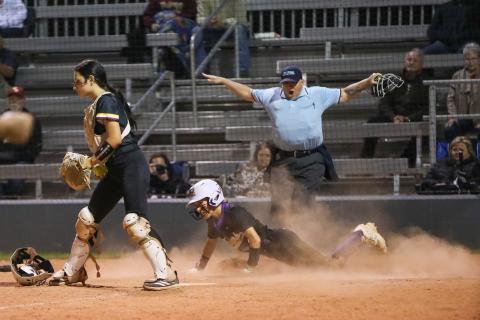 Columbia left fielder Addyson Sherman slides safely into home plate to score the game-winning run in the ninth inning of Thursday's 2-1 win against West Nassau. (BRENT KUYKENDALL/Lake City Reporter)