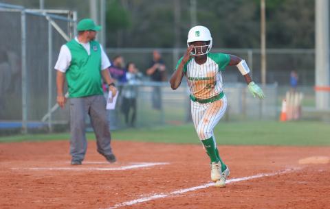 Suwannee outfielder Brianna Stephens-Woods races home to score a run against Branford on March 19. (PAUL BUCHANAN/Lake City Reporter)