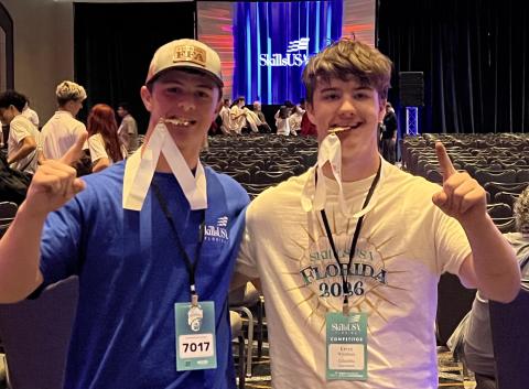 Columbia High’s Rylan Moses (left) and Kevin Windham won the SkillsUSA state competition gold medal for drones last week in Jacksonville. (COURTESY)