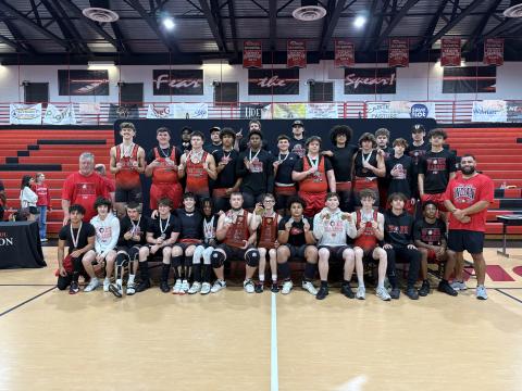 Fort White’s boys weightlifting team poses with the District 6-1A trophies on Wednesday. (COURTESY)