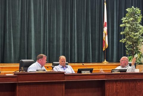 Columbia County Commission Chairman Tim Murphy (left) and Commissioner Rocky Ford (right) engage in a back-and-forth shouting match during Thursday’s meeting over the sale of the wastewater treatment plant at the North Florida Mega Industrial Park to the City of Lake City. (JAMIE WACHTER/Lake City Reporter)