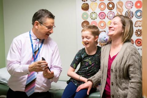 Marley Gaskins and her mother, Tamara Hogue, are pictured with UCLA Dr. Donald Kohn during a visit to California to take part in a clinical trial to combat severe leukocyte adhesion deficiency-I in 2019. Gaskins was the first patient to enroll in the study. (COURTESY)