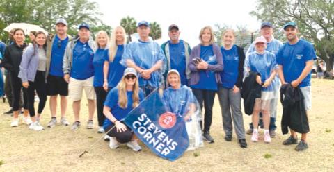 Members of the group Stevens Corner gather for a photo during the Walk to Defeat ALS Jacksonville on May 2 at The Friendship Fountain. The group consisted of 39 family members and friends of Don Stevens. (COURTESY)
