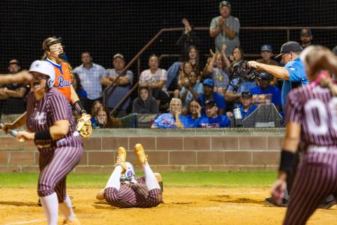 Branford pitcher Harleigh Price reacts at home plate after Madison County center fielder Ryleigh Bass scored the game-winning run on a wild pitch thrown by Price in the bottom of the ninth inning of Wednesday's Region 3-R final. (JACK HOWDESHELL/Lake City Reporter)
