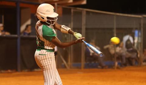 Suwannee outfielder Brianna Stephens-Woods swings at a pitch against Branford on March 19. (PAUL BUCHANAN/Lake City Reporter)