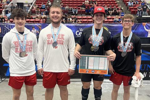 Fort White lifters Andrew Ulsch (from left, second in Olympic and fifth in traditional), Adam Ford (fifth in Olympic), Jonathan Ulsch (state champion in traditional, second in Olympic) and Matthew Koontz (fourth in traditional) all reached the medal stand at the Class 1A state meet on Friday. (COURTESY)