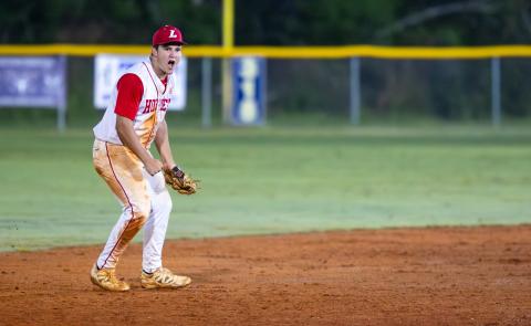 Lafayette shortstop Trevor Byrd (3) celebrates after recording the final out in the Hornets' comeback win over Aucilla Christian in Game 3 of the Region 3-R semifinals on Saturday. (JACK HOWDESHELL/Lake City Reporter)