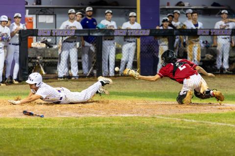 Lafayette catcher Brayden Richardson can't reel in a throw as Union County scores a run during Game 1 of the Region 3-R finals on Friday. (JACK HOWDESHELL/Lake City Reporter)