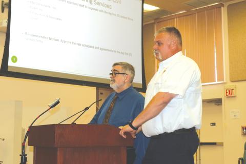 Columbia County Fire Rescue Assistant Chief Lance Hill (right) and County Manager David Kraus discussed the importance of EMS services in the county during the County Commission’s meeting on Thursday. (TONY BRITT/Lake City Reporter)