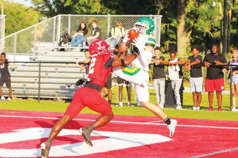 Lake City Reporter freelance photographer Brent Kuykendall’s photo of Suwannee receiver Koy Frier’s attempted grab against Bradford last spring won first place. (BRENT KUYKENDALL/Lake City Reporter)