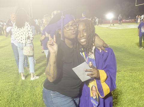 Zacariah Williams (left) was able to surprise her sister Rajaeh at Columbia High’s graduation on Friday, making a special moment for both. (COURTESY)