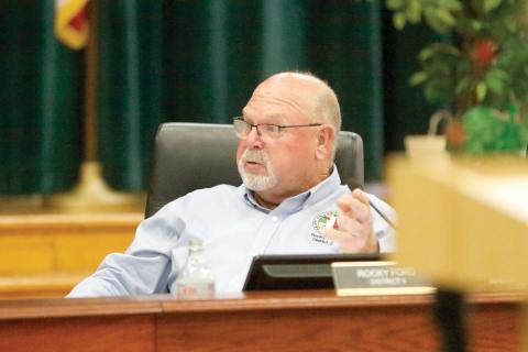 Columbia County Commissioner Rocky Ford said he wants to see a plan for converting dirt roads into paved ones during a workshop Thursday. (JAMIE WACHTER/Lake City Reporter)