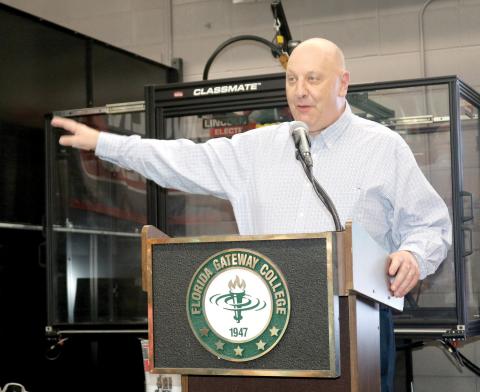 Florida Gateway College President Larry Barrett, speaking at the grand opening of the college’s renovated welding facility earlier this month, received a nearly perfect evaluation from the school’s Board of Trustees. (TONY BRITT/Lake City Reporter)