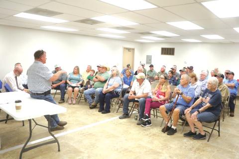 Columbia County Commissioner Tim Murphy (left) leads a discussion on Tuesday regarding a potential new community center in Columbia City. The meeting lasted roughly an hour and set up the next steps in the process. (MORGAN MCMULLEN/Lake City Reporter)