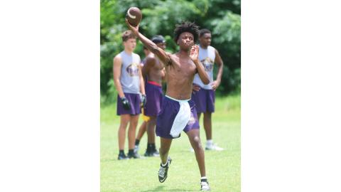 New Columbia quarterback Amari Green throws a pass in 7-on-7 drills during Monday’s summer workout. (JORDAN KROEGER/Lake City Reporter)