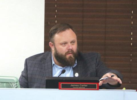 Lake City Councilman James Carter speaks during Monday’s council meeting. Carter recused himself from a vote on public benches due to his presidency with the Kiwanis Club of Lake City, which benefits through a grant program for the upkeep and maintenance of the benches. (MORGAN MCMULLEN/Lake City Reporter)