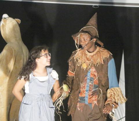 Aaliyah Salva (left) and Khloe Maddox meet for the first time as Dorothy and the Scarecrow during rehearsal for New Generation Christian School’s upcoming production of ’The Wizard of Oz.’ The play is set to be performed Friday at 6:30 p.m. on the school’s campus. (MORGAN MCMULLEN/Lake City Reporter)