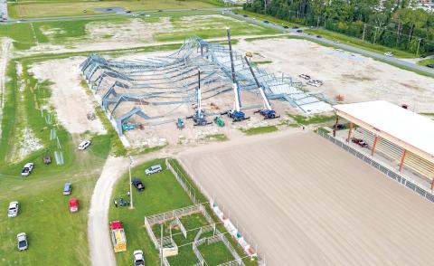 The new covered rodeo arena at the Florida Gateway Fairgrounds collapsed Wednesday afternoon. The A frame structure of the new facility was being constructed when it collapsed. (RAY CARPENTER/Lake City Reporter)
