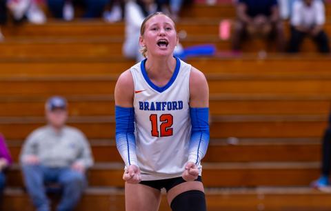 Branford libero Ava Alcorn celebrates after a point during last season's Class Rural Final Four. (JACK HOWDESHELL/Lake City Reporter)