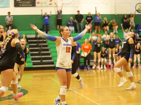 Branford libero Ava Alcorn and her teammates celebrate match point after rallying to defeat Suwannee in five sets Tuesday night. (PAUL BUCHANAN/Lake City Reporter)