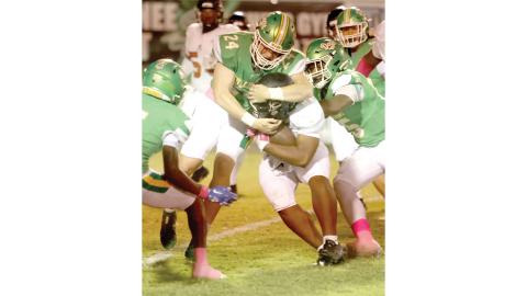 Suwannee linebacker Kyler Watson wraps up an Atlantic Coast ballcarrier last year. (PAUL BUCHANAN/Lake City Reporter)