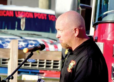 Kyle Nickerson, speaking at the annual Patriot Day ceremony on Friday, has been named Live Oak’s new fire chief. (ROB WOLFE/Lake City Reporter)
